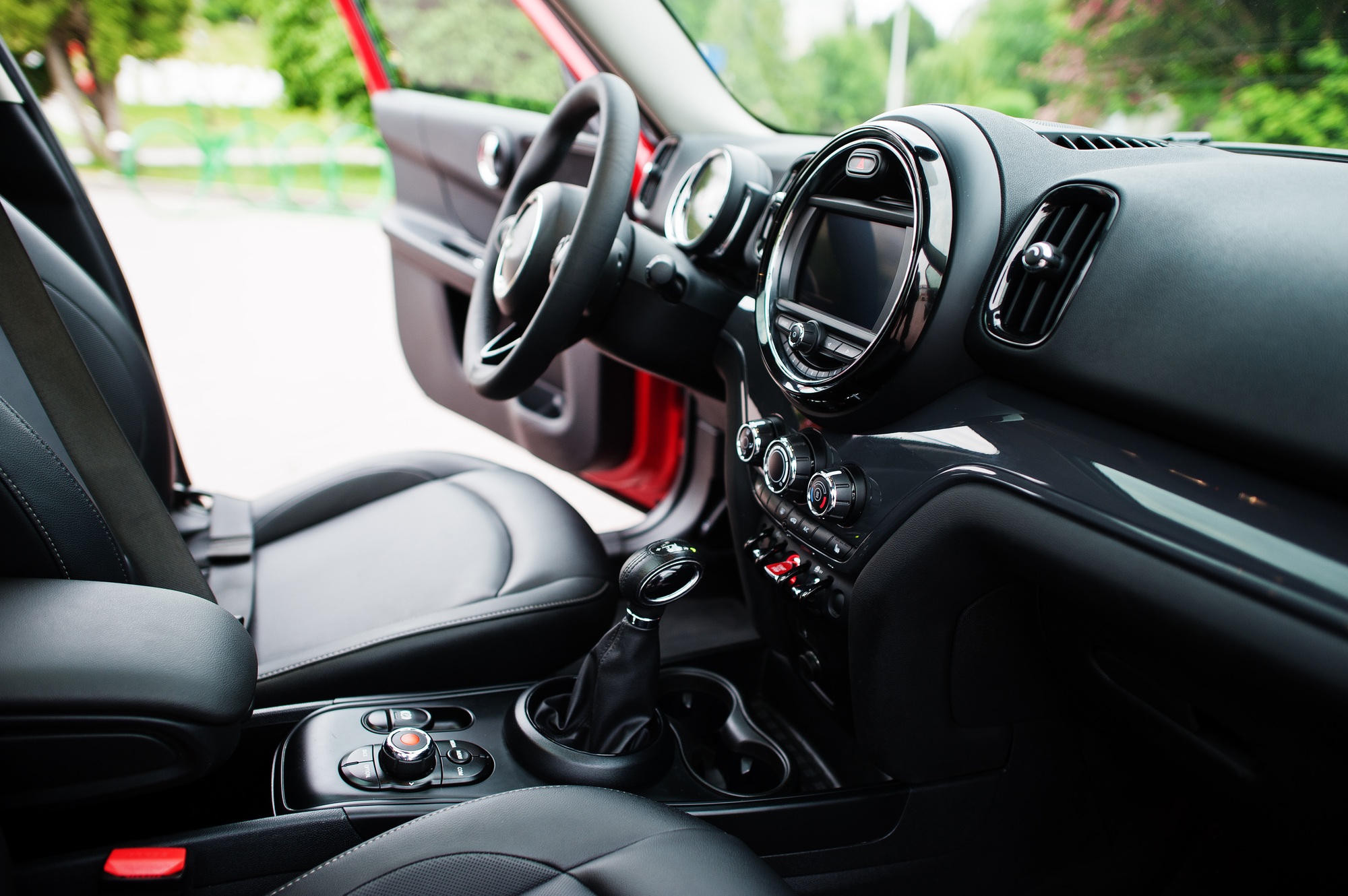 Interior of red city car. Small car for cities.